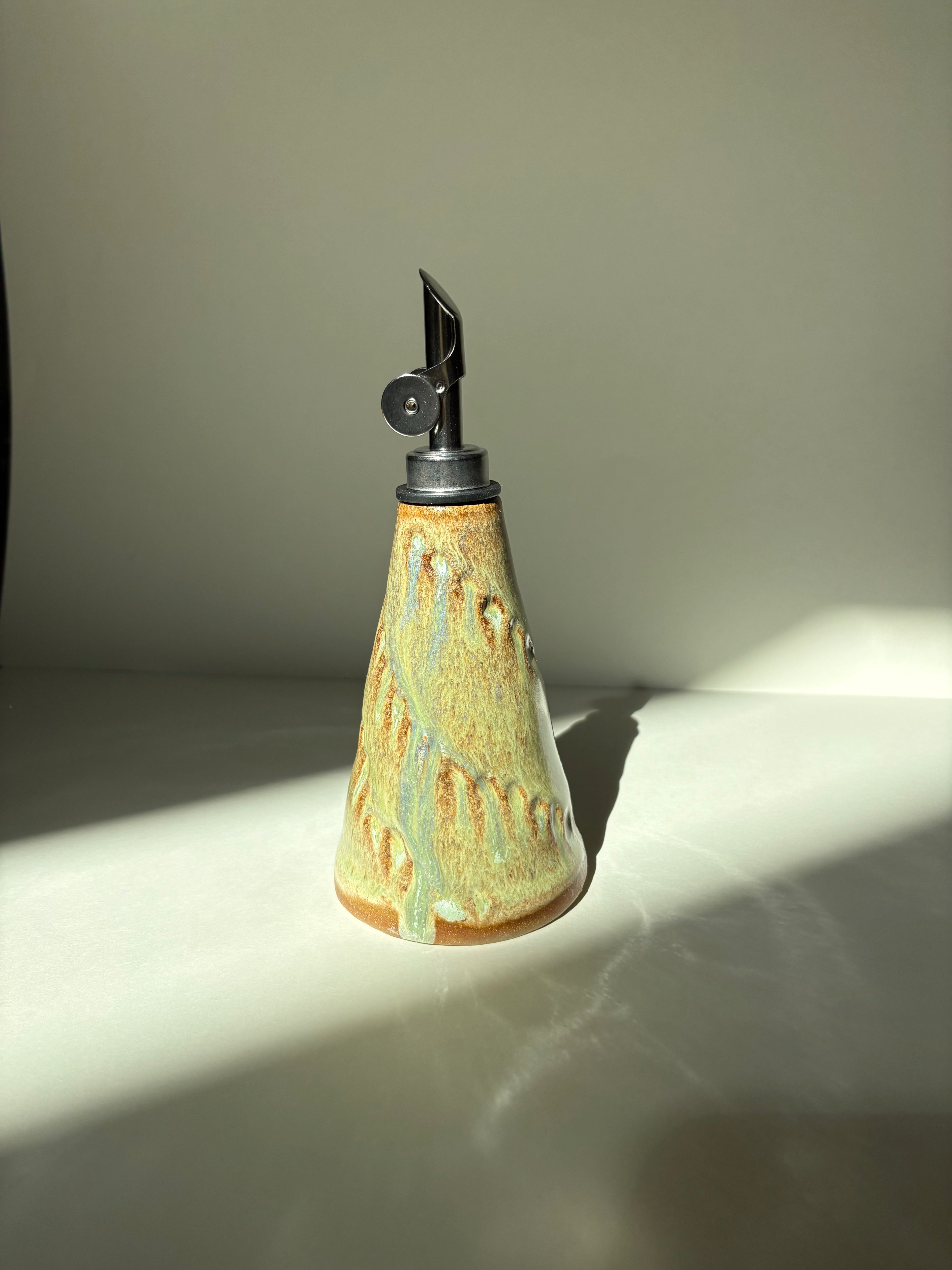 Spiral textured light green oil dispenser - 27