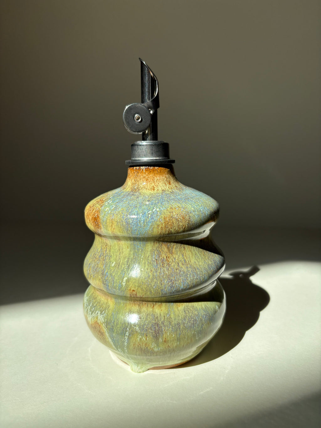 Green and blue oil dispenser - 21